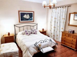 Krevet ili kreveti u jedinici u objektu One bedroom house with city view private pool and enclosed garden at Arriate
