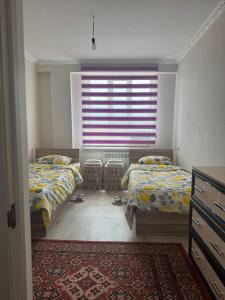 Guest House Umar客房内的一张或多张床位