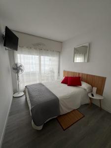 Ένα ή περισσότερα κρεβάτια σε δωμάτιο στο Apartamiento vista al Mar - Holiday center en Roses