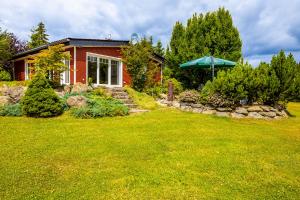 Κήπος έξω από το Ferienhaus Chalet Bergblick