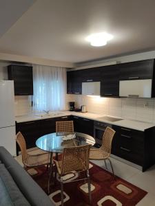 Фотография из галереи ALEXANDRA BOUTIQUE RESIDENCE Garden Apartment в городе Александруполис