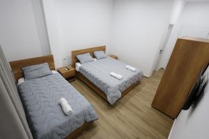 Ένα ή περισσότερα κρεβάτια σε δωμάτιο στο Guesthouse Aurel