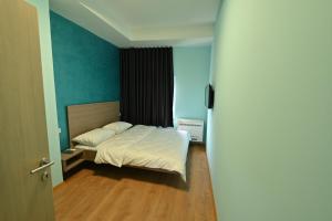 Easy Apartments Kumanovo 객실 침대
