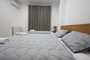 Ένα ή περισσότερα κρεβάτια σε δωμάτιο στο Guesthouse Aurel