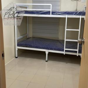 Krevet ili kreveti na kat u jedinici u objektu DECA HOMES ORTIGAS by AR's PLACE