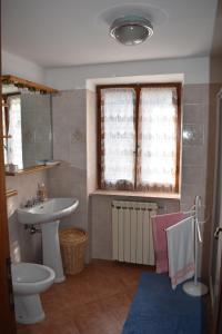 Koupelna v ubytování Casa di Alice