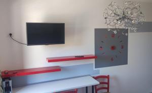 TV a/nebo společenská místnost v ubytování B&B Extremo Sud