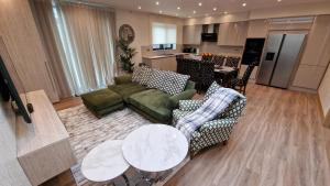 Posezení v ubytování Deluxe House + 20 fotografií