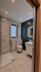 Koupelna v ubytování Deluxe House