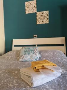 Postel nebo postele na pokoji v ubytování Borgo Fiore House