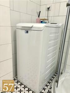 Ένα μπάνιο στο Piękny przytulny apartament - blisko akwenu wodnego