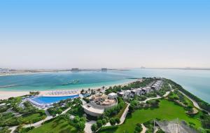 an aerial view of a resort on the beach at Mövenpick Resort Al Marjan Island in Ras al Khaimah