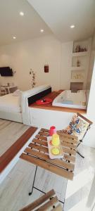 a room with a bed and a tray with a drink on it at BARBARA Classy Apartments 103, Wellness in Syracuse