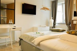 Voodi või voodid majutusasutuse R & J Hotel toas
