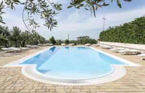 Piscina en o cerca de Masseria Gravelle