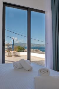 Postel nebo postele na pokoji v ubytování El Mare Hotel