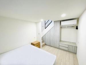 Giường trong phòng chung tại 礁溪楓禾Maple