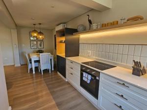 Köök või kööginurk majutusasutuses Hilton Homestead by ANEW