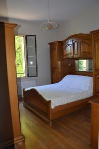 Postel nebo postele na pokoji v ubytování Gîte Le Petit Rouyot 3*