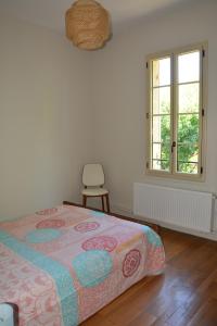 Postel nebo postele na pokoji v ubytování Gîte Le Petit Rouyot 3*