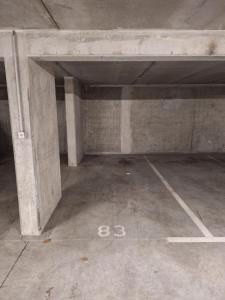 an empty parking lot with the number thirtyeight on the floor at Appartement Pont des Catalans in Toulouse