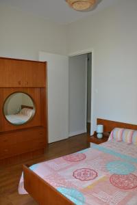 Postel nebo postele na pokoji v ubytování Gîte Le Petit Rouyot 3*