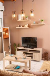TV a/nebo společenská místnost v ubytování La perla loft
