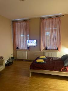 En eller flere senger på et rom på Budapest Clark Apartman **