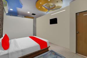 Cama o camas de una habitación en POP Hotel Dk Guest House