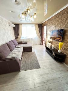 Χώρος καθιστικού στο Двухкомнатные апартаменты на улице Катаева, дом 20 +18 φωτογραφίες