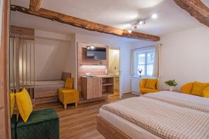 Letto o letti in una camera di Glockenhof Studtmann