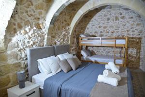 Katil atau katil-katil dalam bilik di San Pawl bnb farmhouse CALYPSO