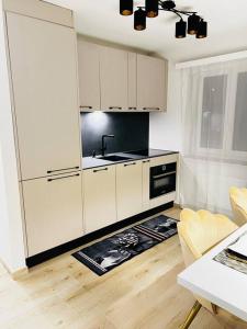 Kuchyň nebo kuchyňský kout v ubytování Valère II - appartement de 3,5 pièces de standing
