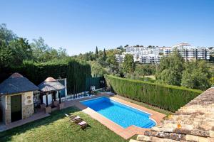 Вид на бассейн в Villa For Families los Agaves или окрестностях