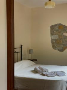 Posteľ alebo postele v izbe v ubytovaní Agriturismo Piano di Andrea