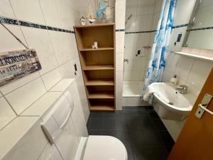 Ένα μπάνιο στο Apartement Seeblick +3 φωτογραφίες