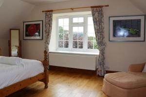 Postel nebo postele na pokoji v ubytování Rookley Farm Lodge - Pet friendly