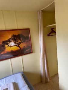 Un pat sau paturi într-o cameră la Tiny House 2 Erwachsene 2 Kinder