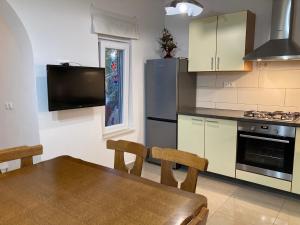 Apartments Nina Silba tesisinde mutfak veya mini mutfak