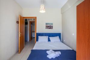 Ένα ή περισσότερα κρεβάτια σε δωμάτιο στο Andrew apartment