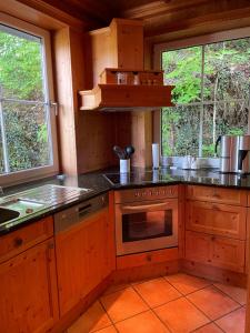 Kuchyň nebo kuchyňský kout v ubytování Ferienwohnung Riverside Resort idyllisch direkt an der Lahn + 16 fotografií