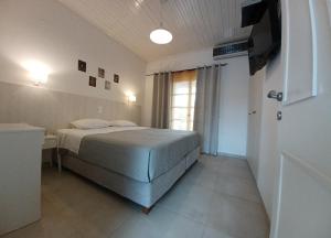 A bed or beds in a room at Babis Apartments & Studios Iremia