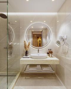 a bathroom with a sink and a mirror at Hasdrubal Thalassa & Spa Djerba in Midoun