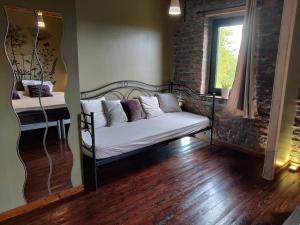 Postel nebo postele na pokoji v ubytování L'Instant Présent