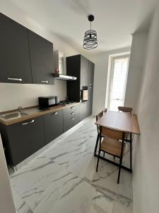Η κουζίνα ή μικρή κουζίνα στο casa vacanze sweethome