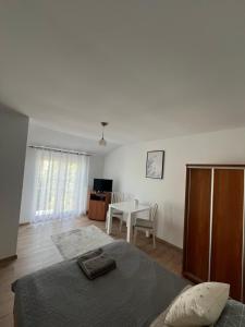 Łóżko lub łóżka w pokoju w obiekcie Łabędź Jastarnia