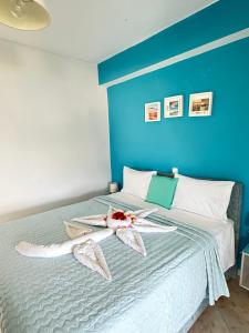 Postel nebo postele na pokoji v ubytování Gikas Apartments