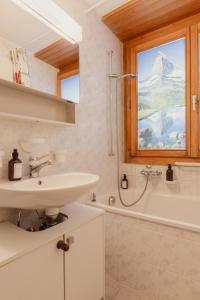 Ванна кімната в Studio dans le plus beau village de Suisse