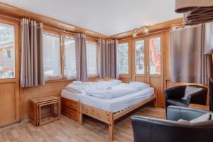 Voodi või voodid majutusasutuse Studio dans le plus beau village de Suisse toas