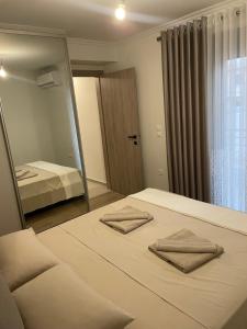 Ένα ή περισσότερα κρεβάτια σε δωμάτιο στο Home Away From Home